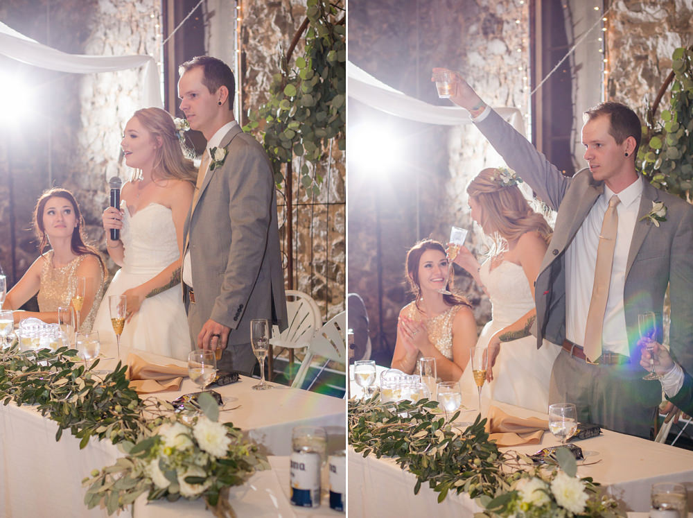 bride and groom giving a toast during their wedding reception by Adrienne & Dani Photography