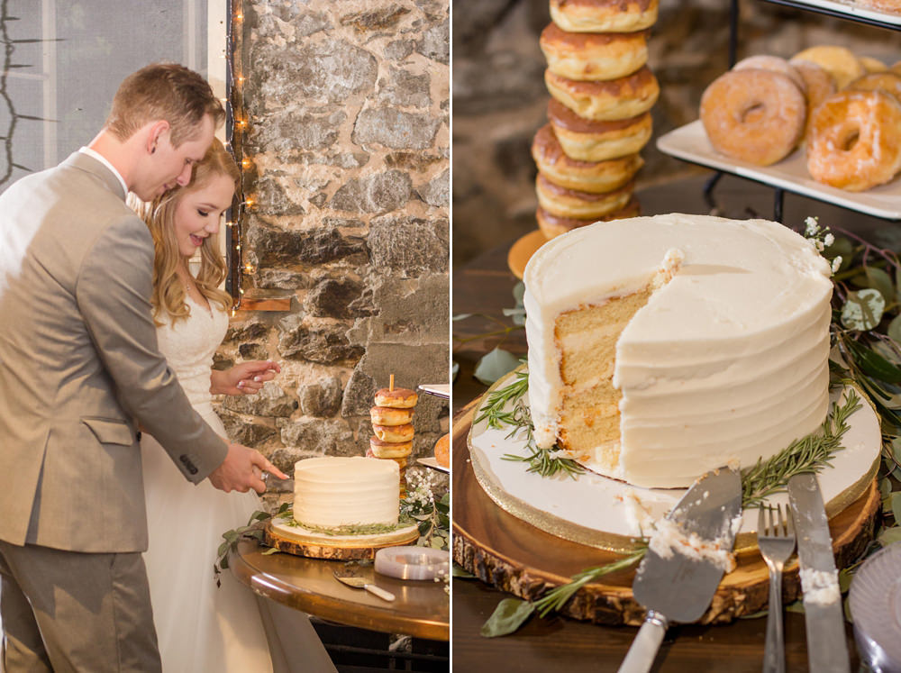 bride and groom cutting their wedding cake during their reception by Adrienne & Dani Photography