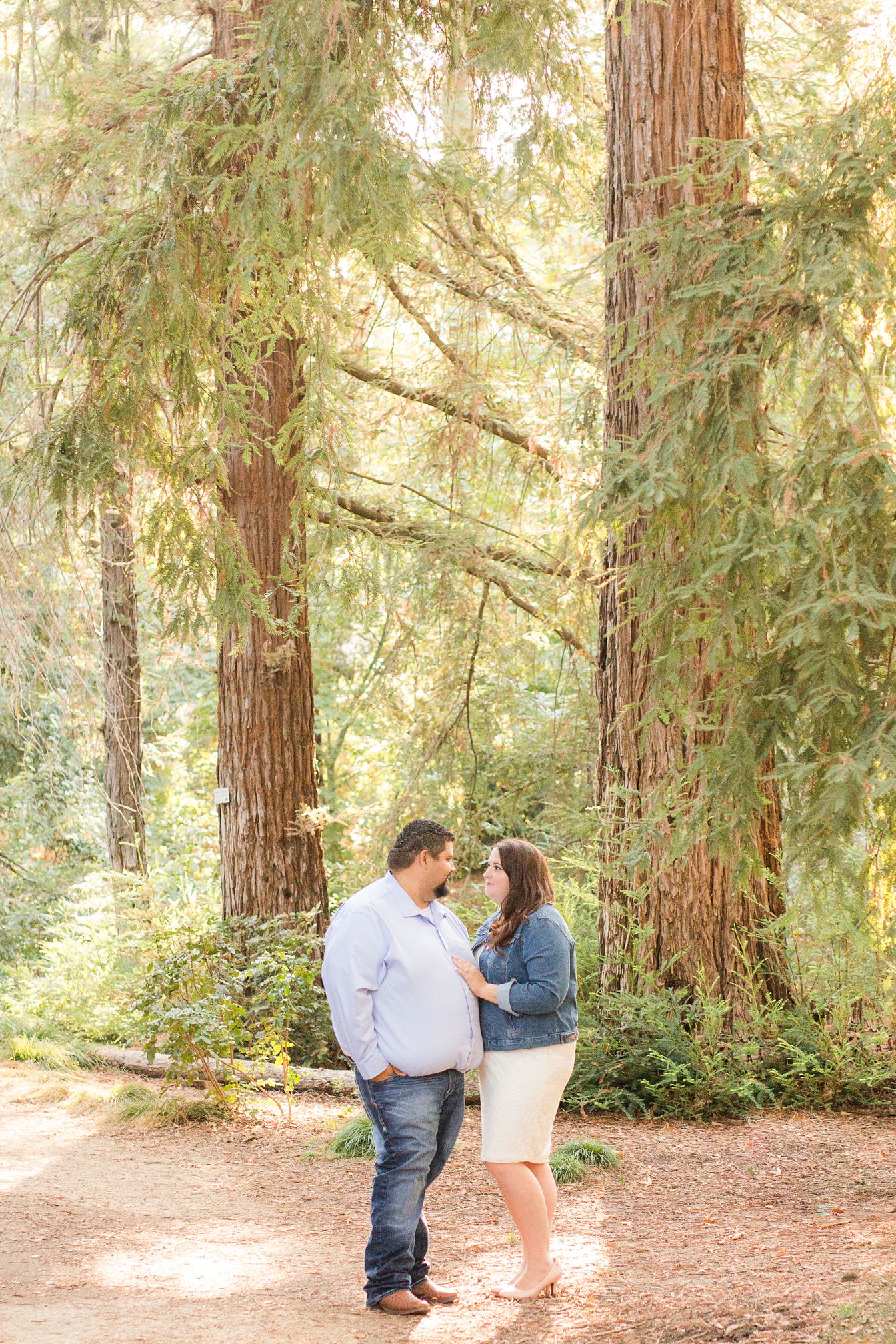 Soon to be Bride and Groom in the woods at their UC Davis Arboretum Engagement by Adrienne and Dani Photography