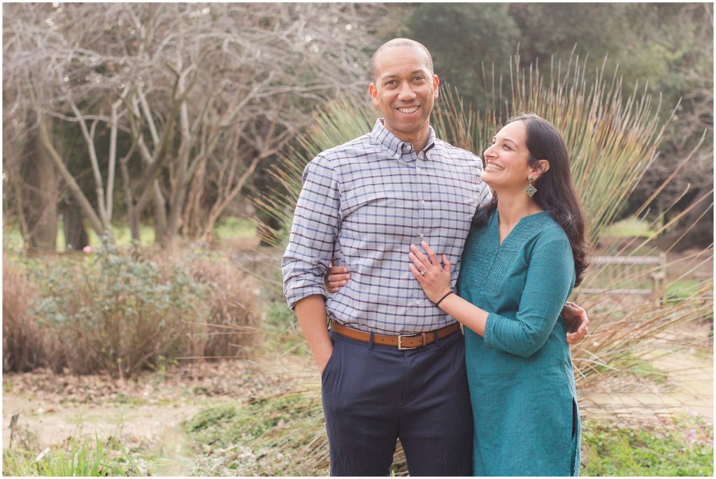 A husband and wife pose for their Sacramento Fall Family Portrait Session.