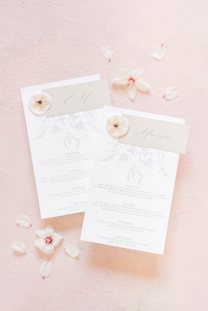 wedding reception menu cards featuring almond blossom details