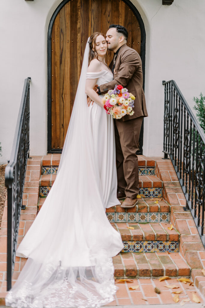 a bride and groom snuggle up at Vizcaya photographed by Sacramento wedding photographers