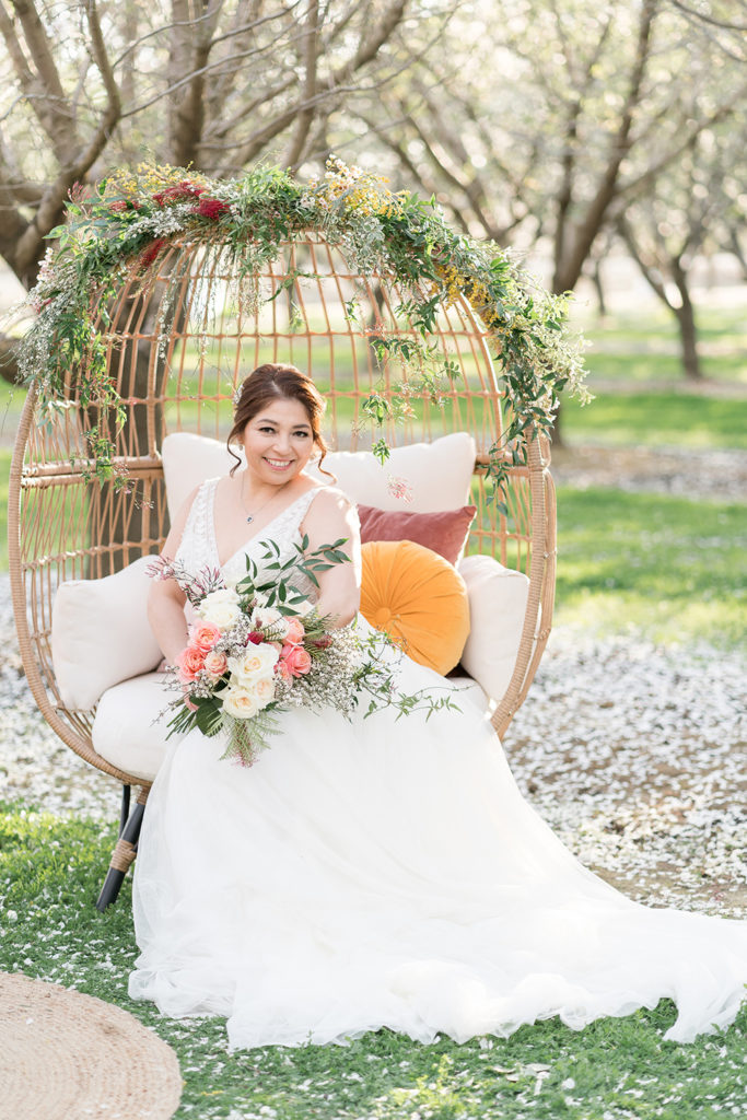 a bride poses at her reception for a bridal portrait