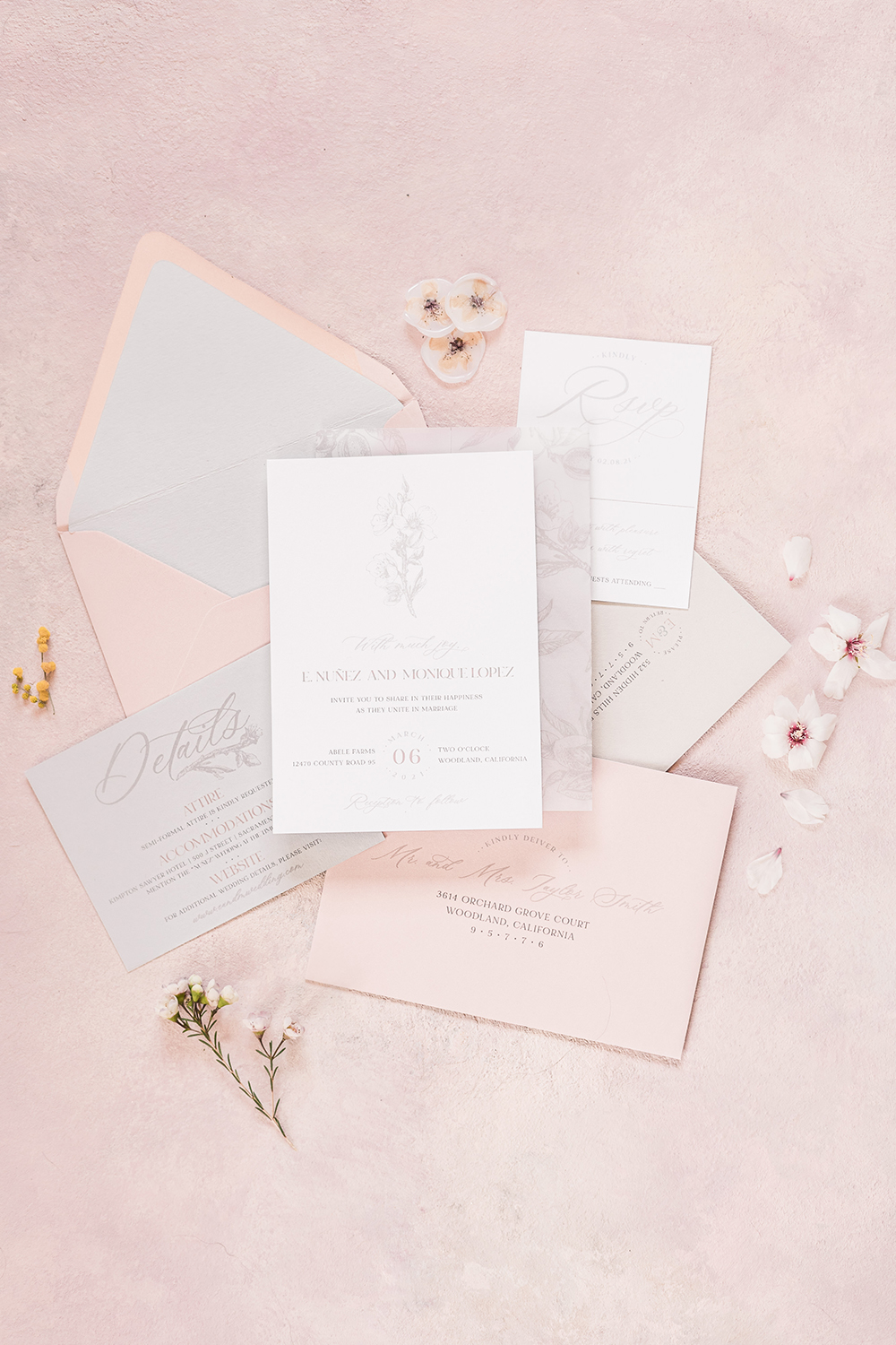 wedding invitation suite featuring almond blossom design elements