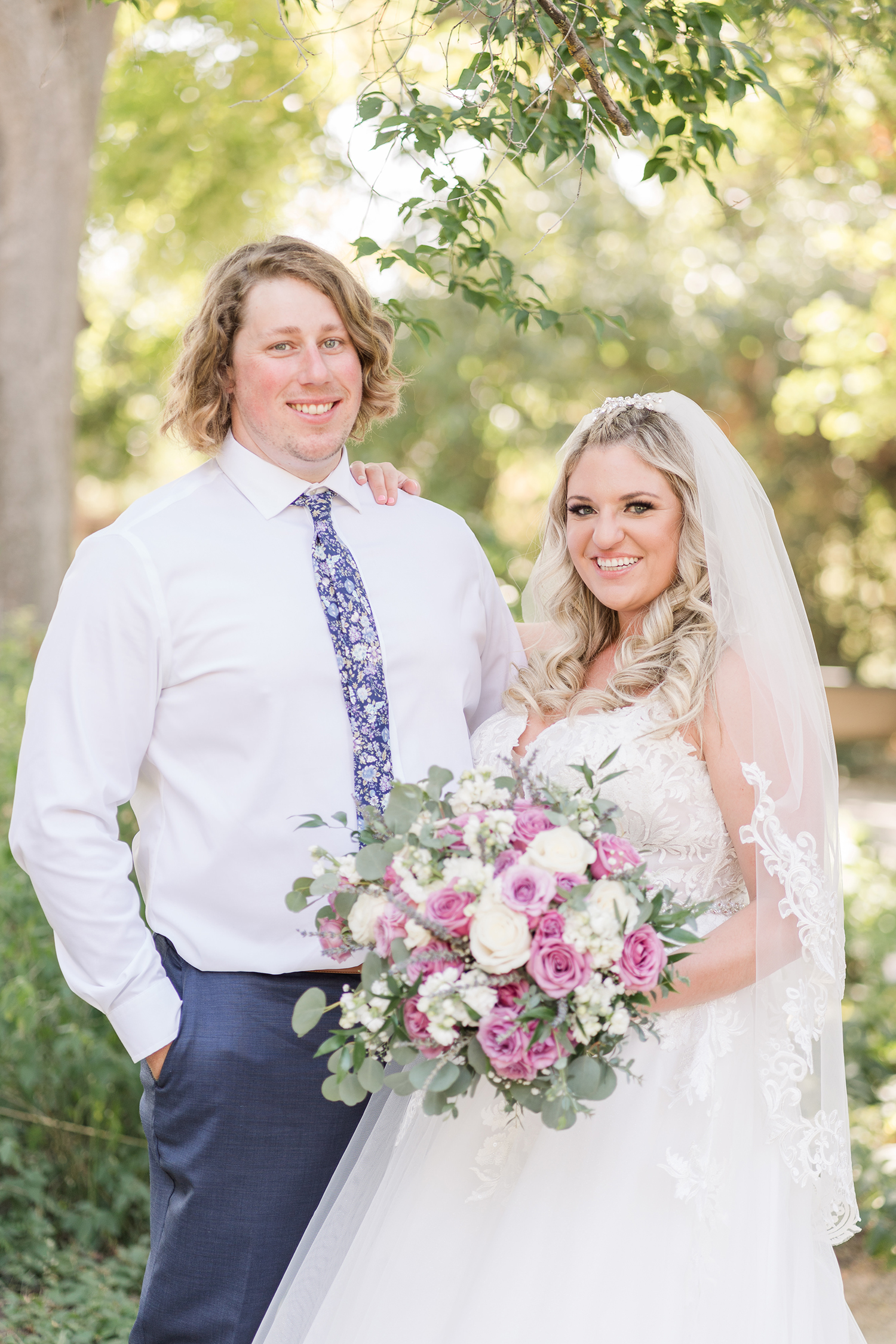 Rustic Barn Wedding in Davis couples portraits by Adrienne and Dani Photography