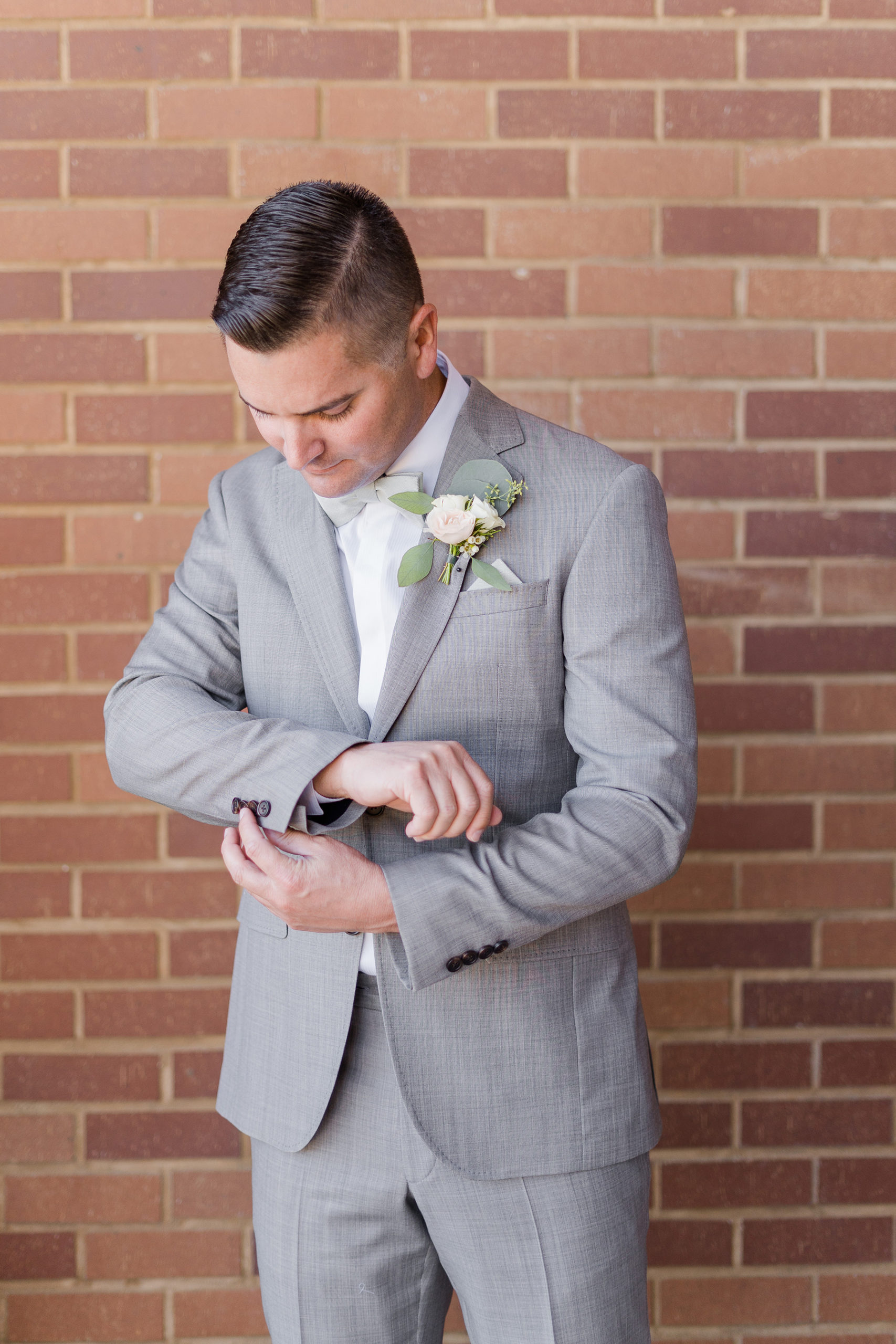 Elk Grove Wedding groom details by Adrienne and Dani Photography