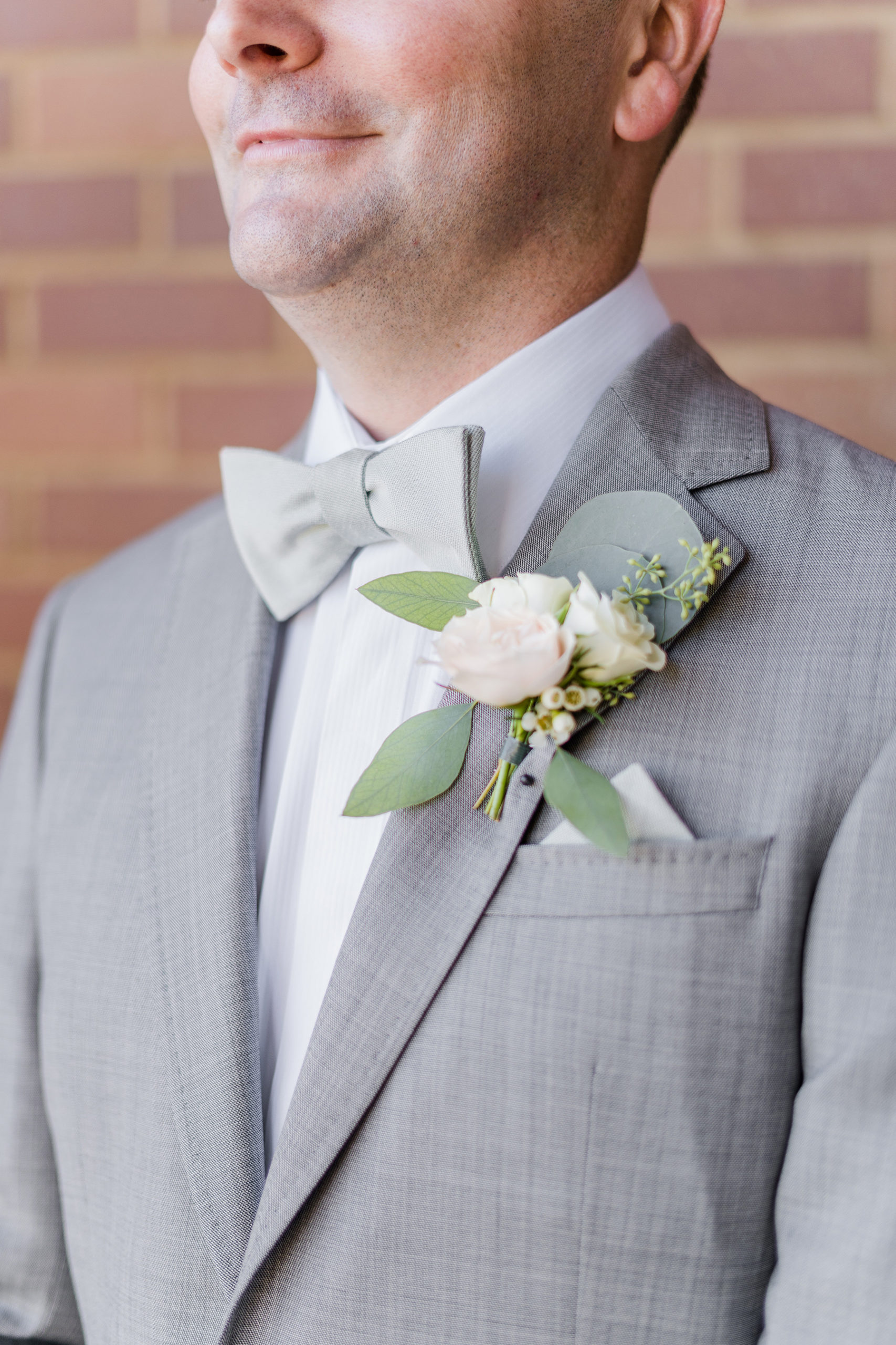 Elk Grove Wedding groom details by Adrienne and Dani Photography