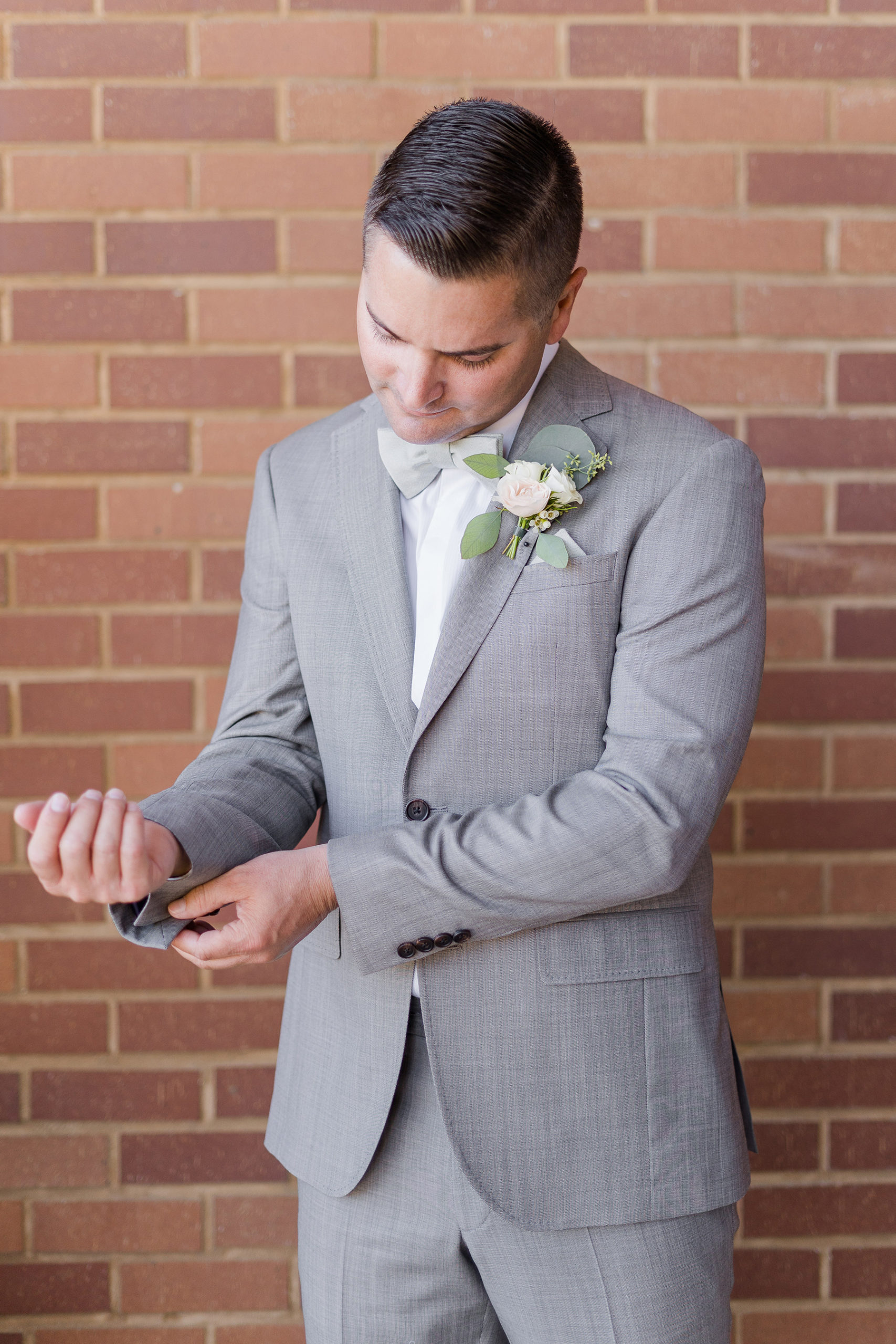 Elk Grove Evergreen Springs Wedding   groom details by Adrienne and Dani Photography