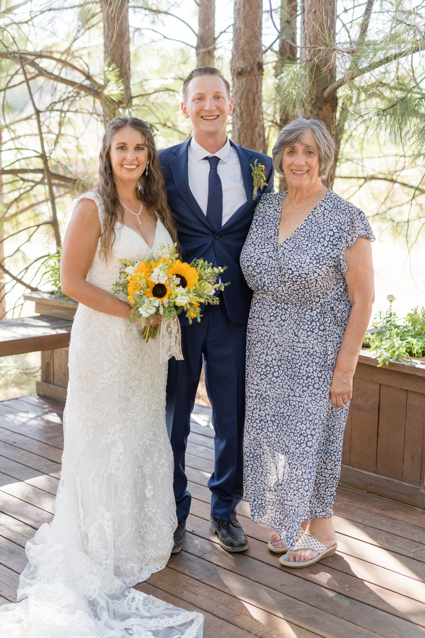 a bride and groom pose with their grandmother for a  a wedding day family portrait by adrienne and dani photography, Napa Wedding Photographers