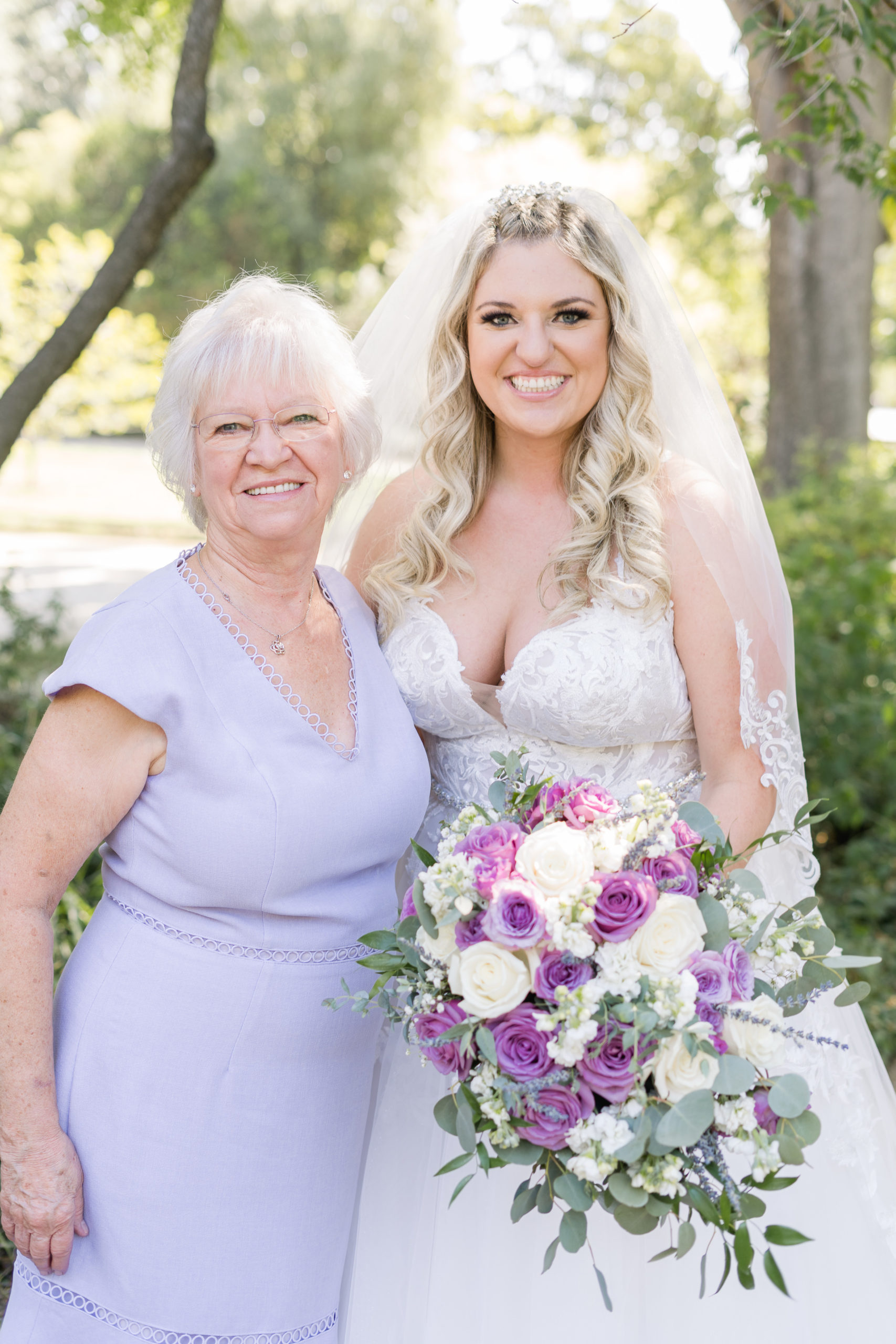 a bride poses with her grandmother for a  a wedding day family portrait by adrienne and dani photography, Napa Wedding Photographers
