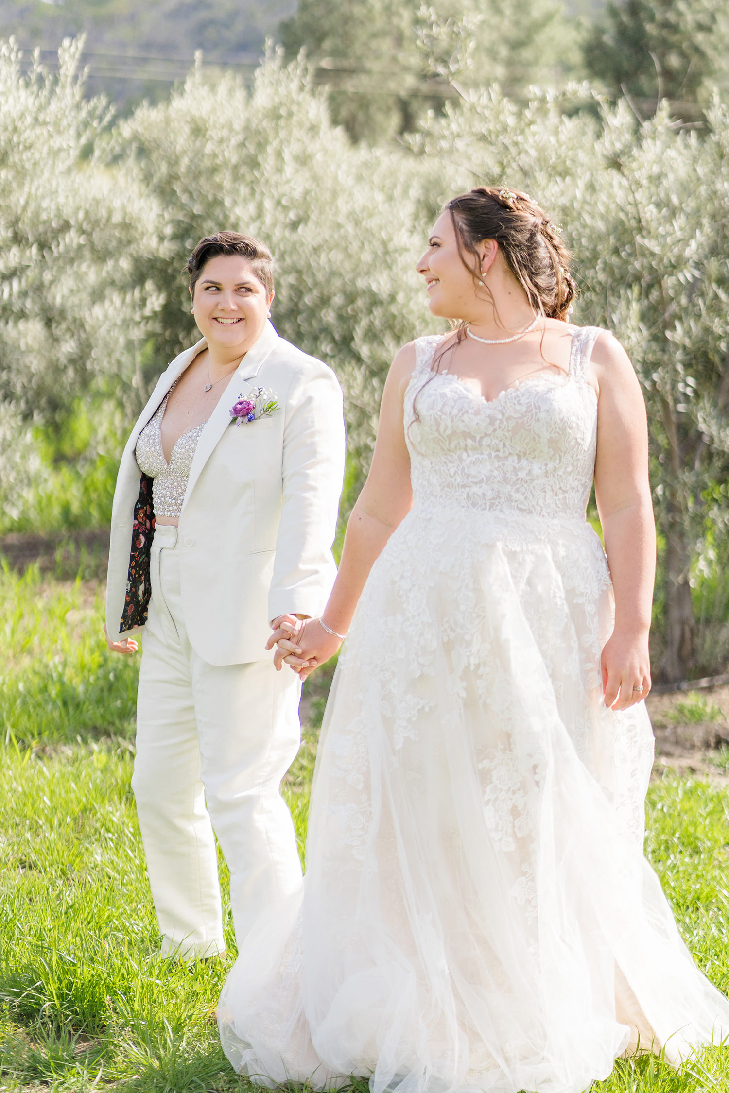 a first look at an lgbtq private estate capay wedding by Adrienne and Dani Photography