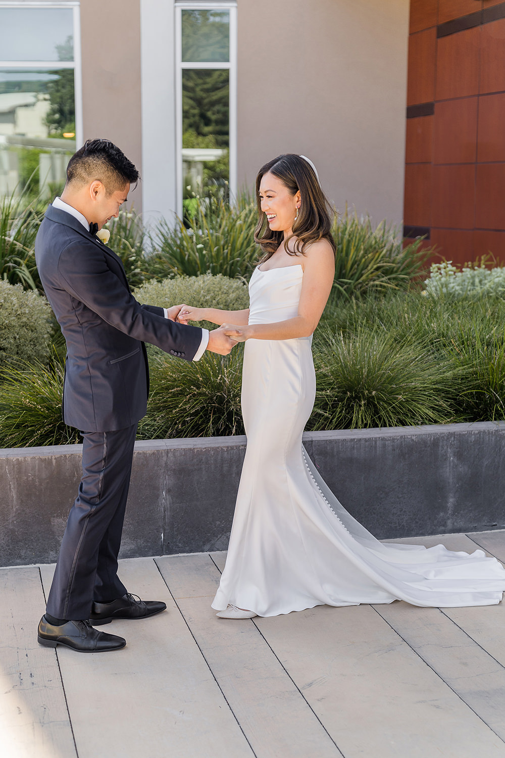 a bride surprises her groom during their first look at their Piedmont Park Wedding