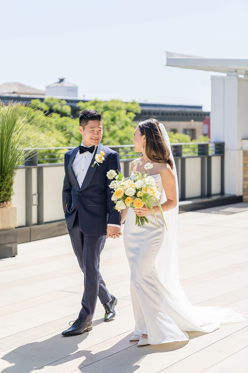 a couple walks together on their way to their Piedmont Park Wedding