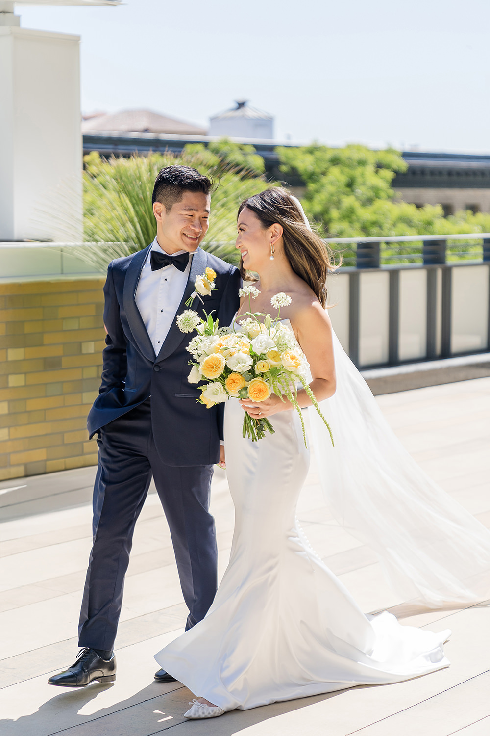 a couple walks together on their way to their Piedmont Park Wedding