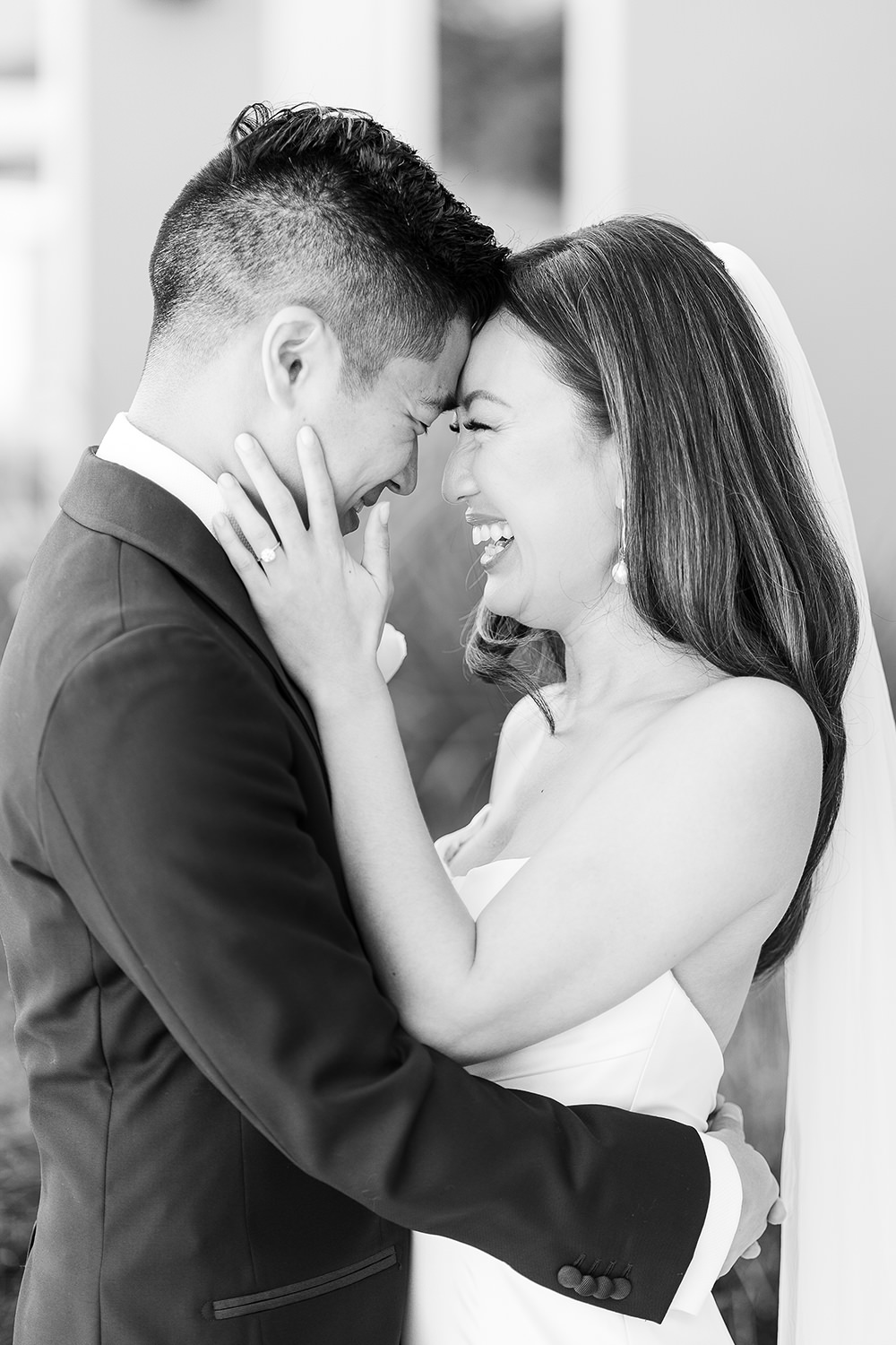 a bride and groom share an intimate moment with their foreheads together at their Piedmont Park Wedding