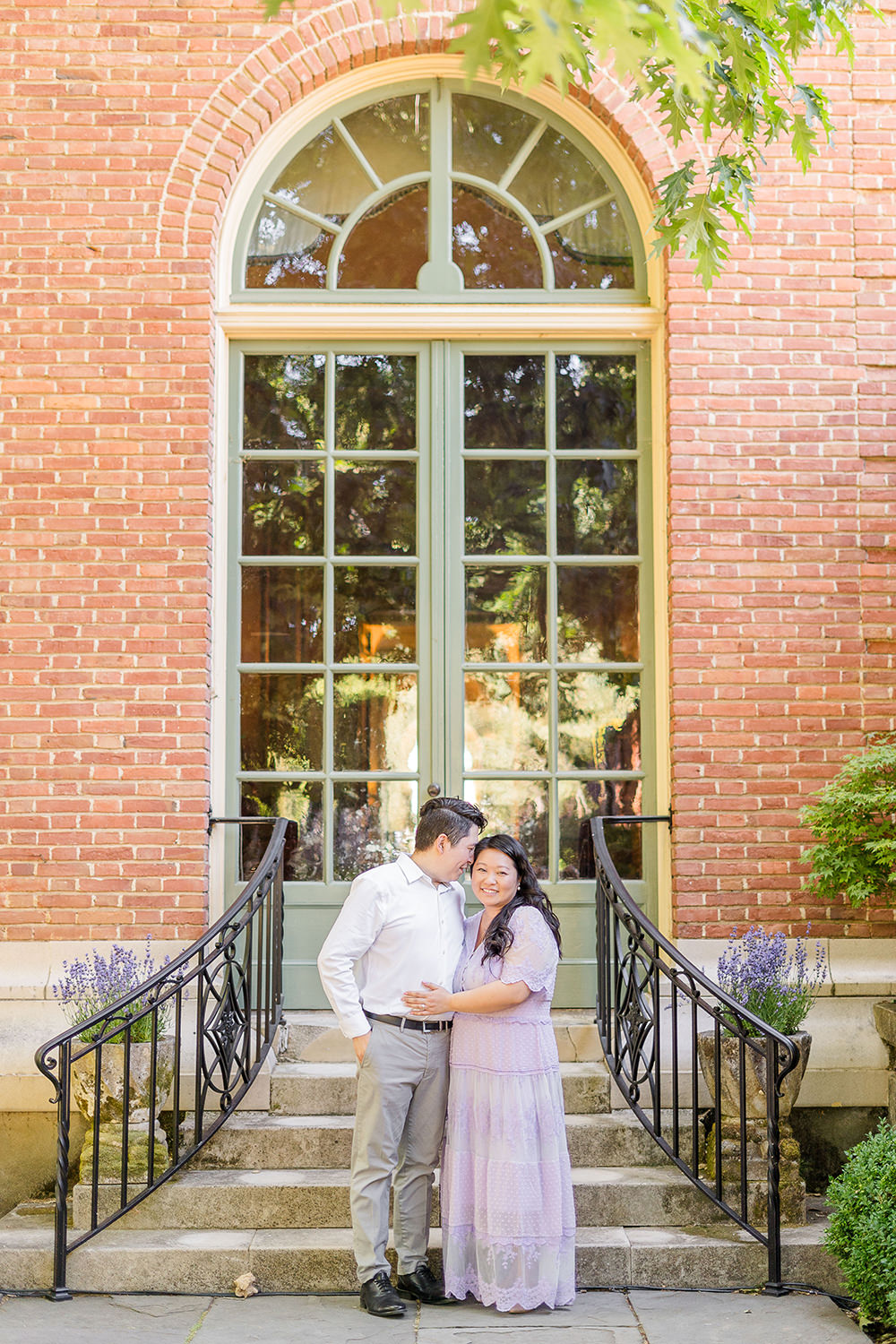 a bride and groom to be share an moment together during their filoli gardens engagement photos.