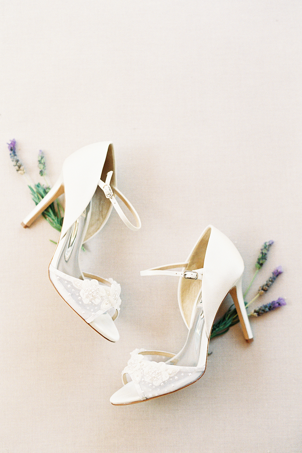 A brides Badgley Mischka bridal heels photographed on Kodak Portra 400 Film 