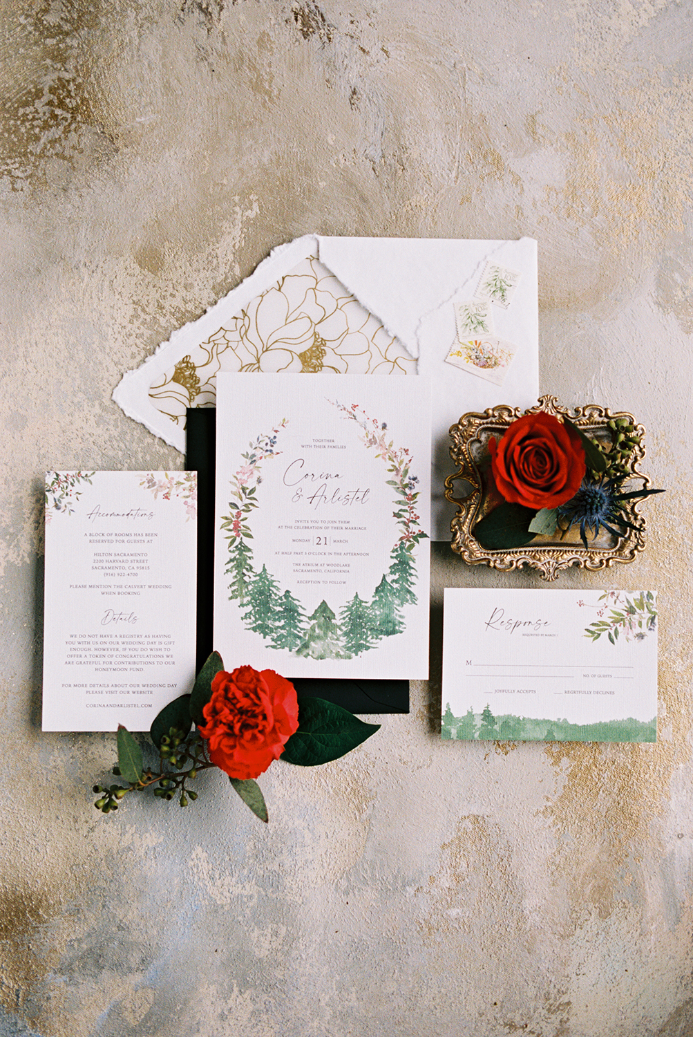 A wedding invitation featuring real roses surrounded by bridal details photographed on Kodak Portra 400 Film 