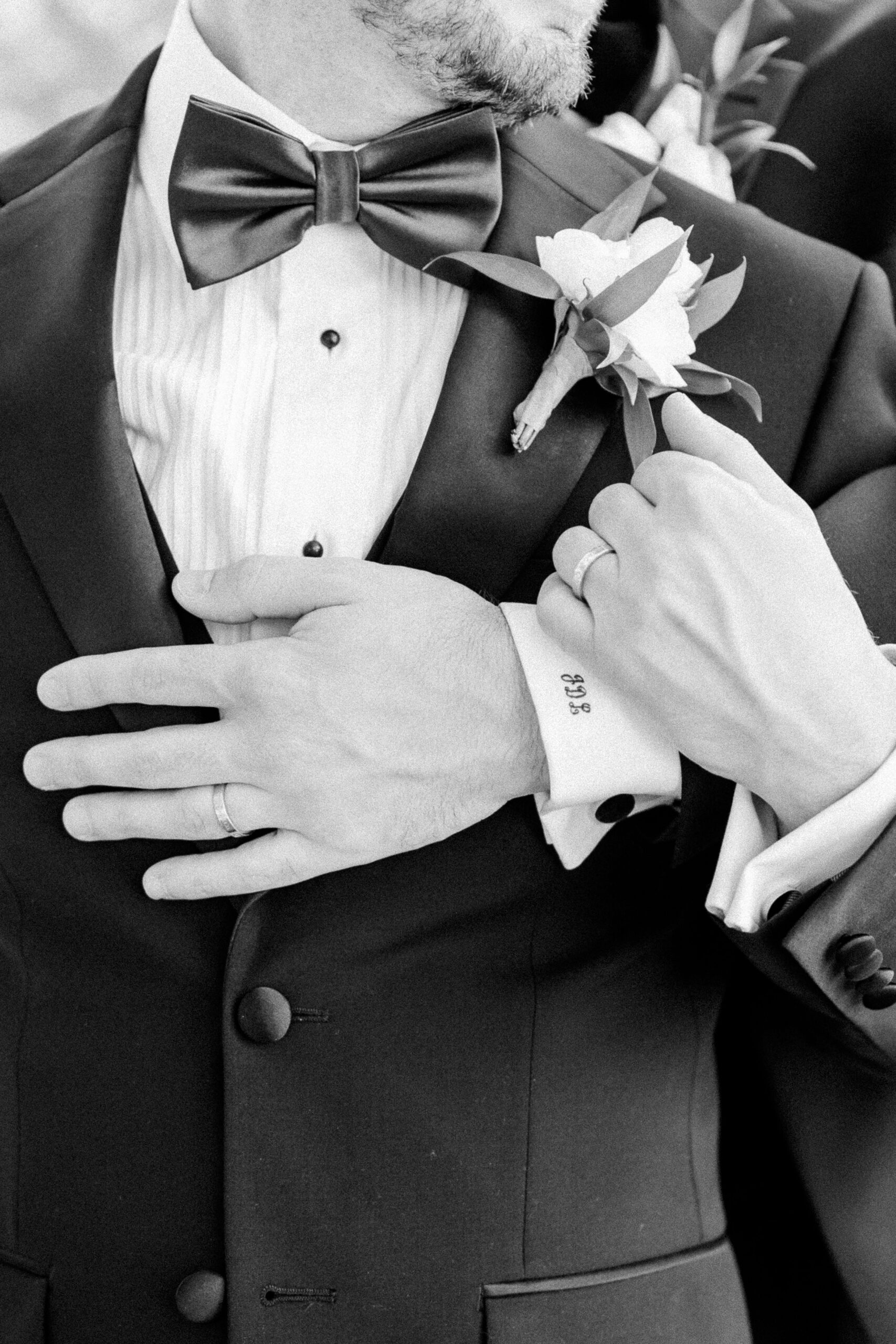 two grooms embrace each other at their Downtown Sacramento Vizcaya Wedding 