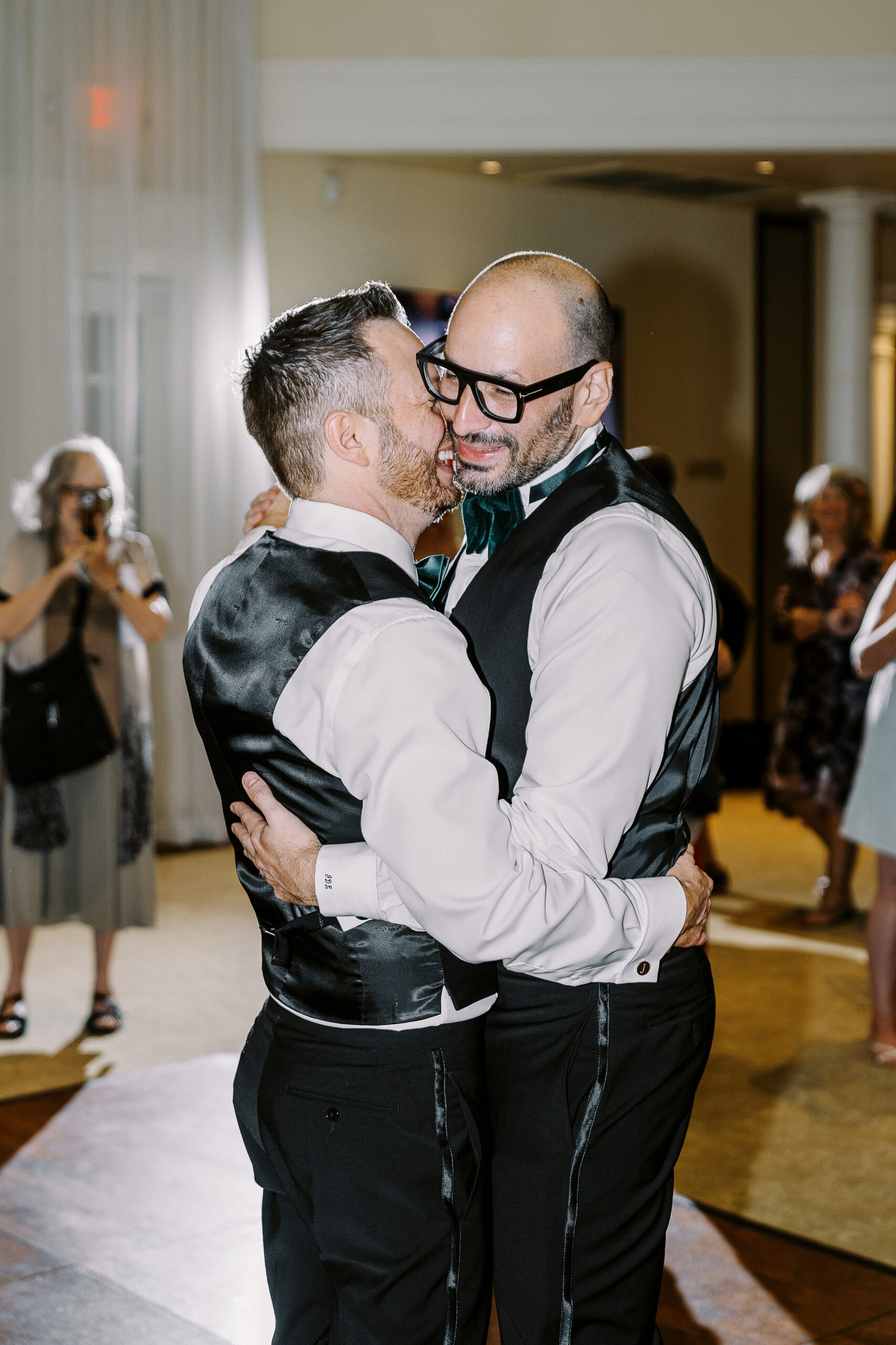 two grooms share their first dance at their Downtown Sacramento Vizcaya Wedding 