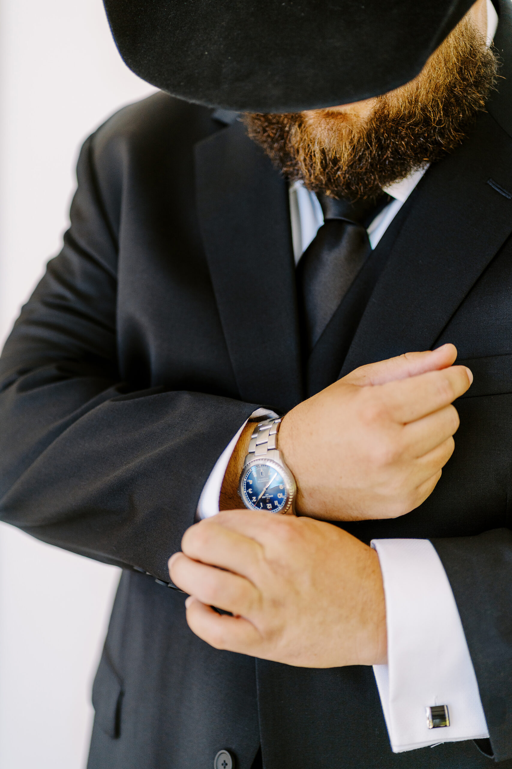 a groom gets ready for his Sonoma winery wedding