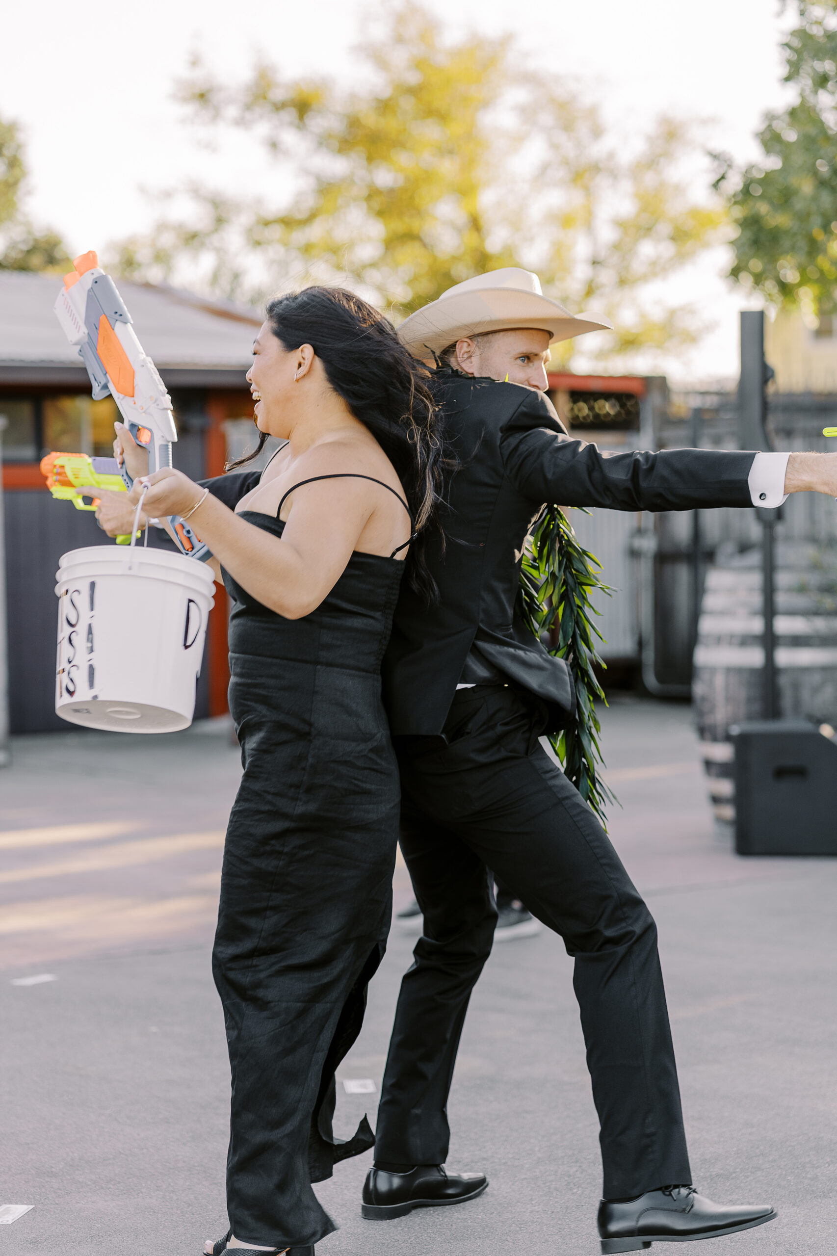 a rowdy wedding party makes their entrances to a reception at a sonoma winery wedding.