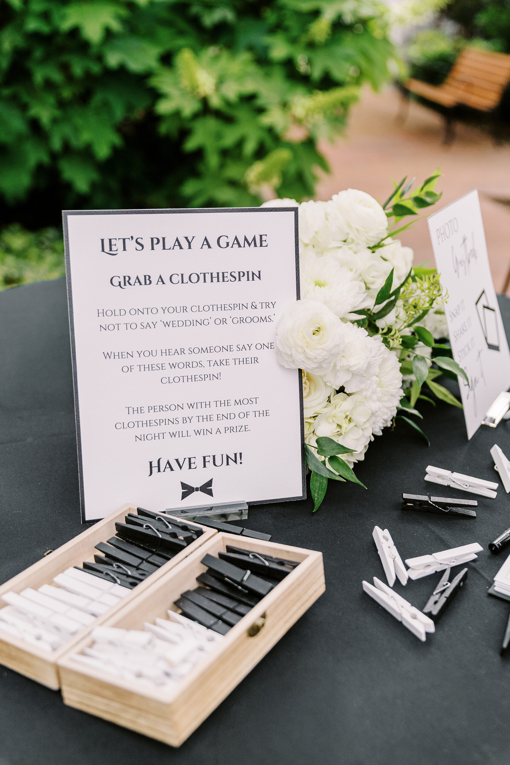 a wedding game posted at the ceremony of a lgbtq vizcaya wedding 