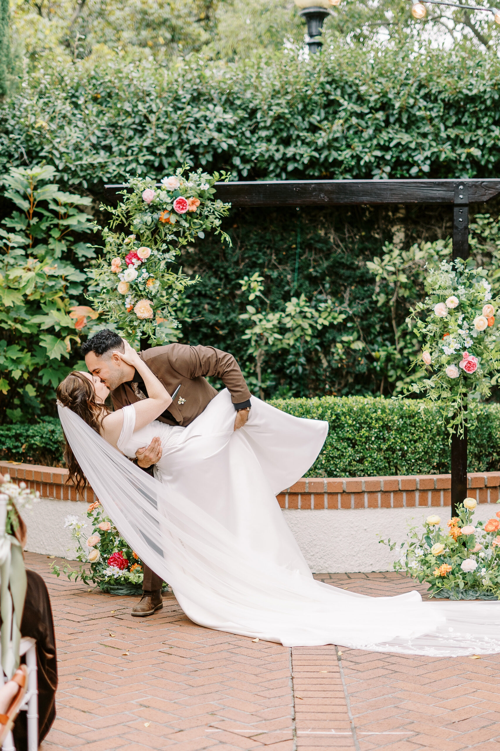 A bride and groom during their courtyard ceremony at Vizcaya photographed by Sacramento wedding photographers