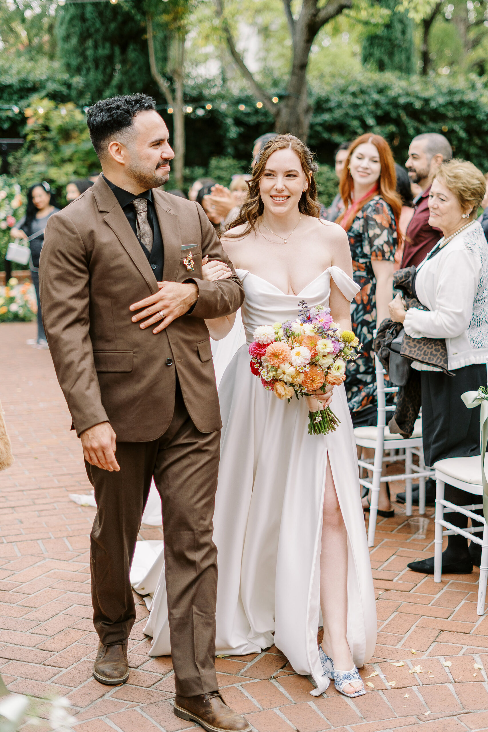 A bride and groom during their courtyard ceremony at Vizcaya photographed by Sacramento wedding photographers