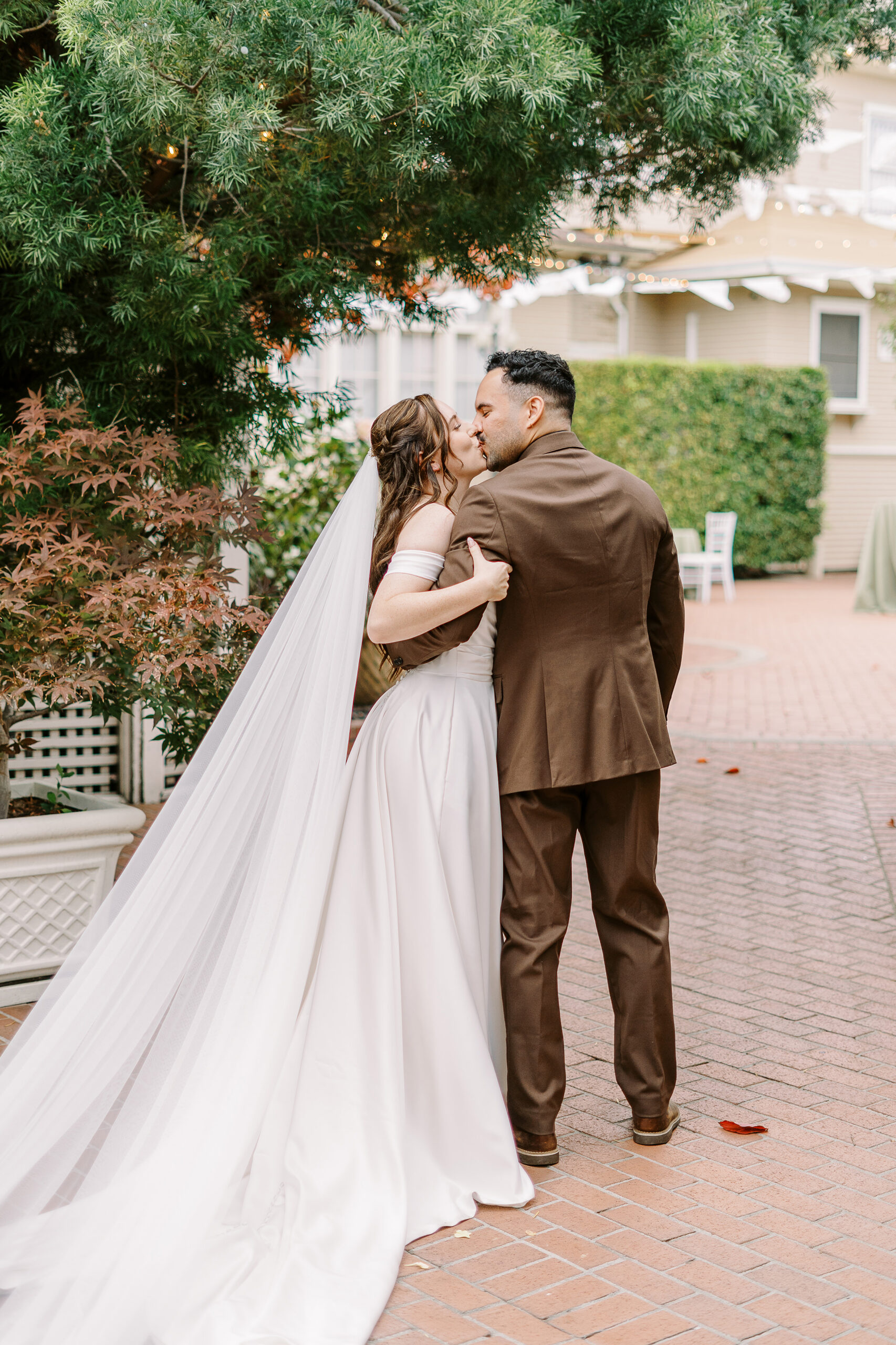 A bride and groom during their courtyard ceremony at Vizcaya photographed by Sacramento wedding photographers