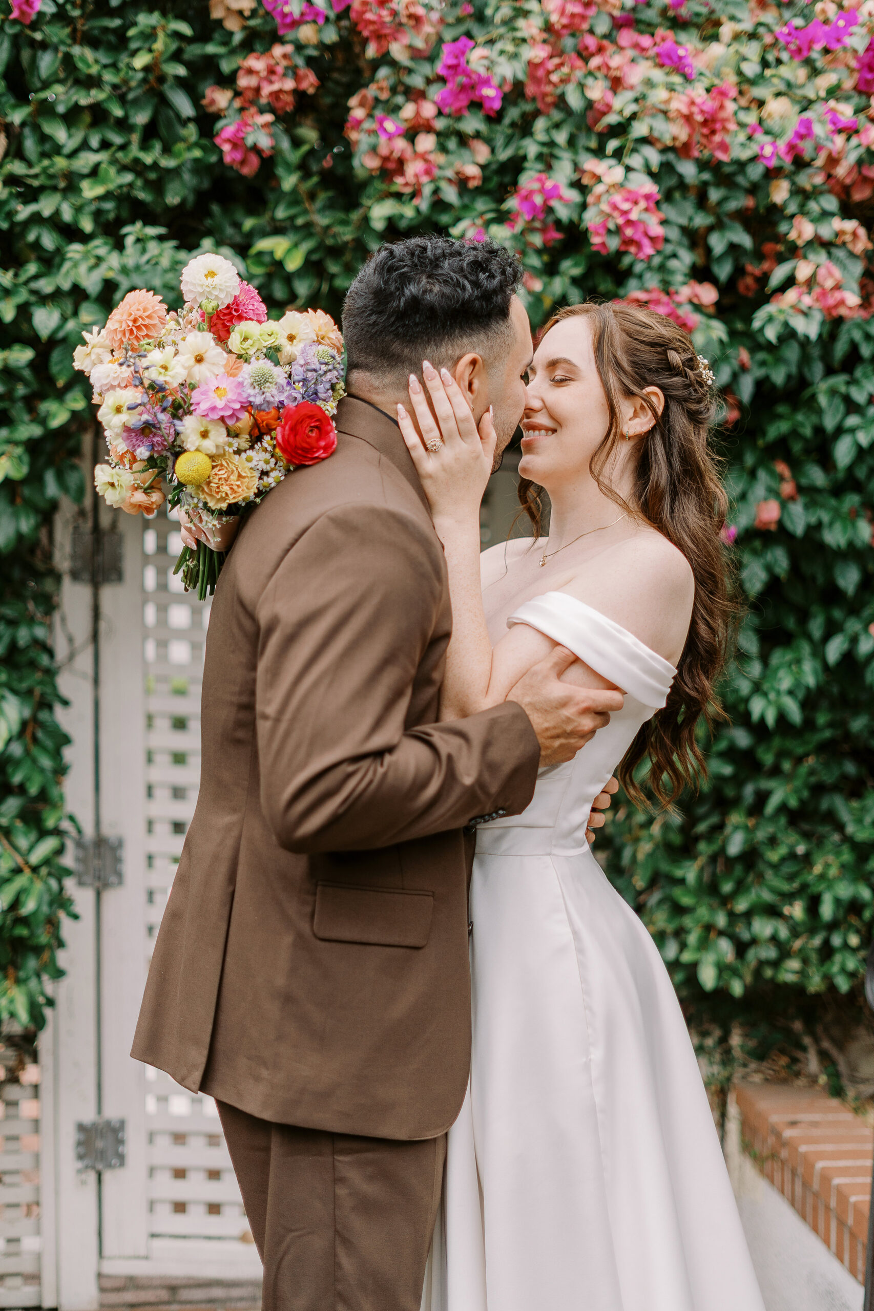 a bride and groom sharing a kiss at Vizcaya photographed by Sacramento wedding photographers