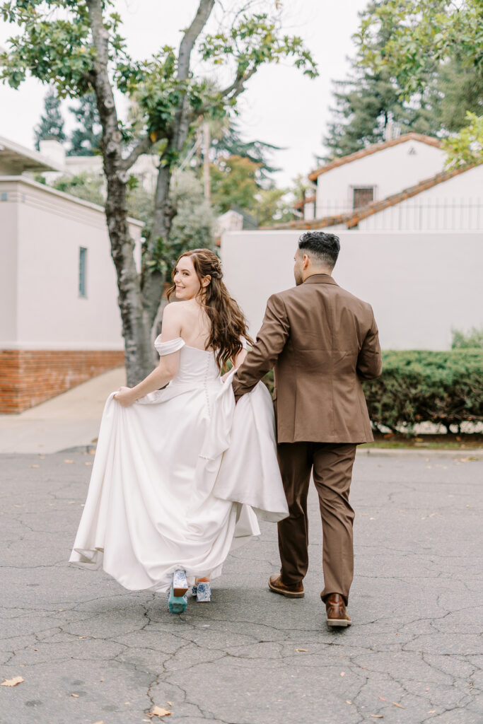 a bride and groom walk together at Vizcaya photographed by Sacramento wedding photographers