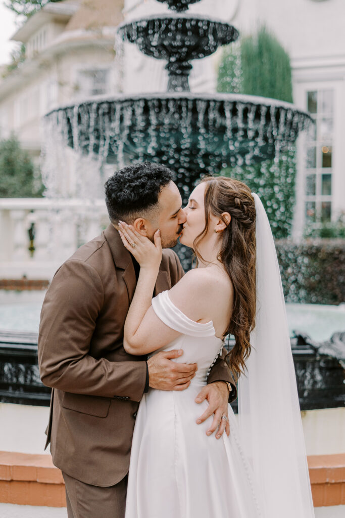 a bride and groom sharing a kiss at Vizcaya photographed by Sacramento wedding photographers