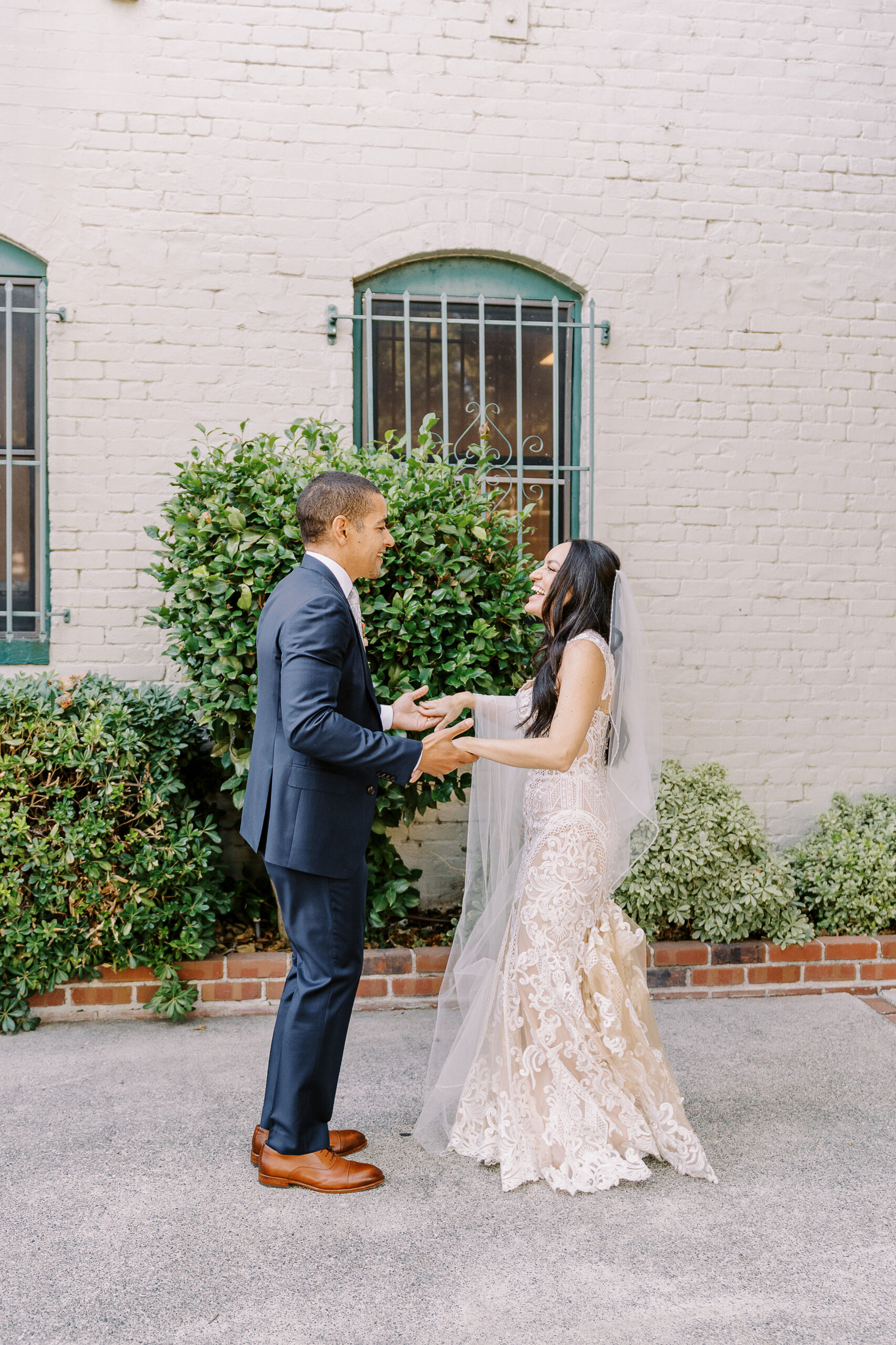 a bride and groom practice their first dance at their midtown Sacramento wedding photographed by Sacramento wedding photographer