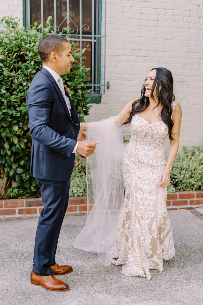 a bride and groom practice their first dance at their midtown Sacramento wedding photographed by Sacramento wedding photographer