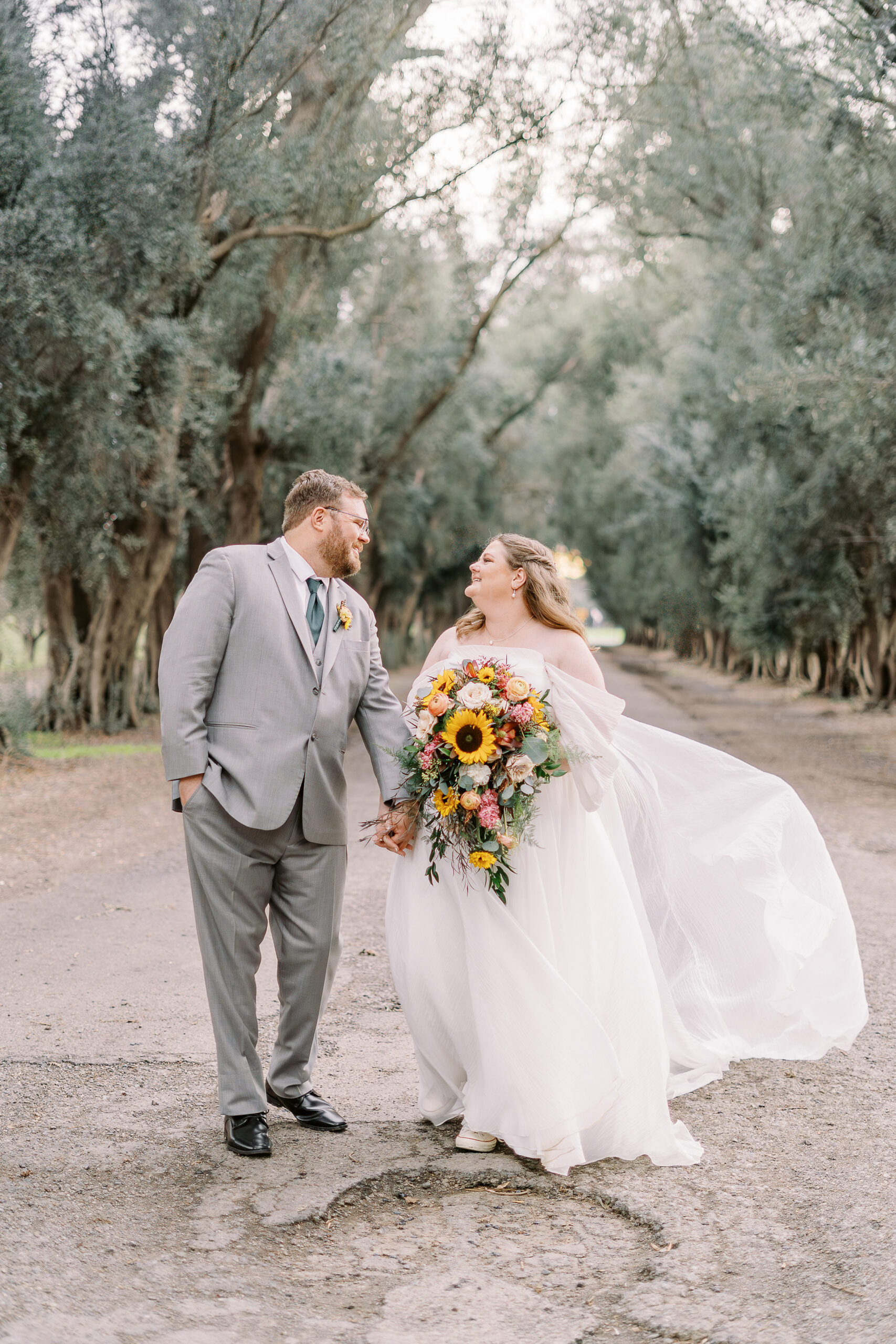 a bride and groom portrait in the trees at The Maples Woodland photographed by Sacramento wedding photographer