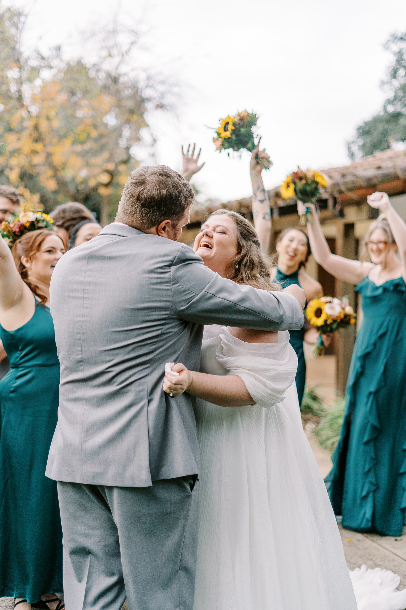 a bride and groom laugh and cry together after their wedding ceremony at The Maples Woodland photographed by Sacramento wedding photographer