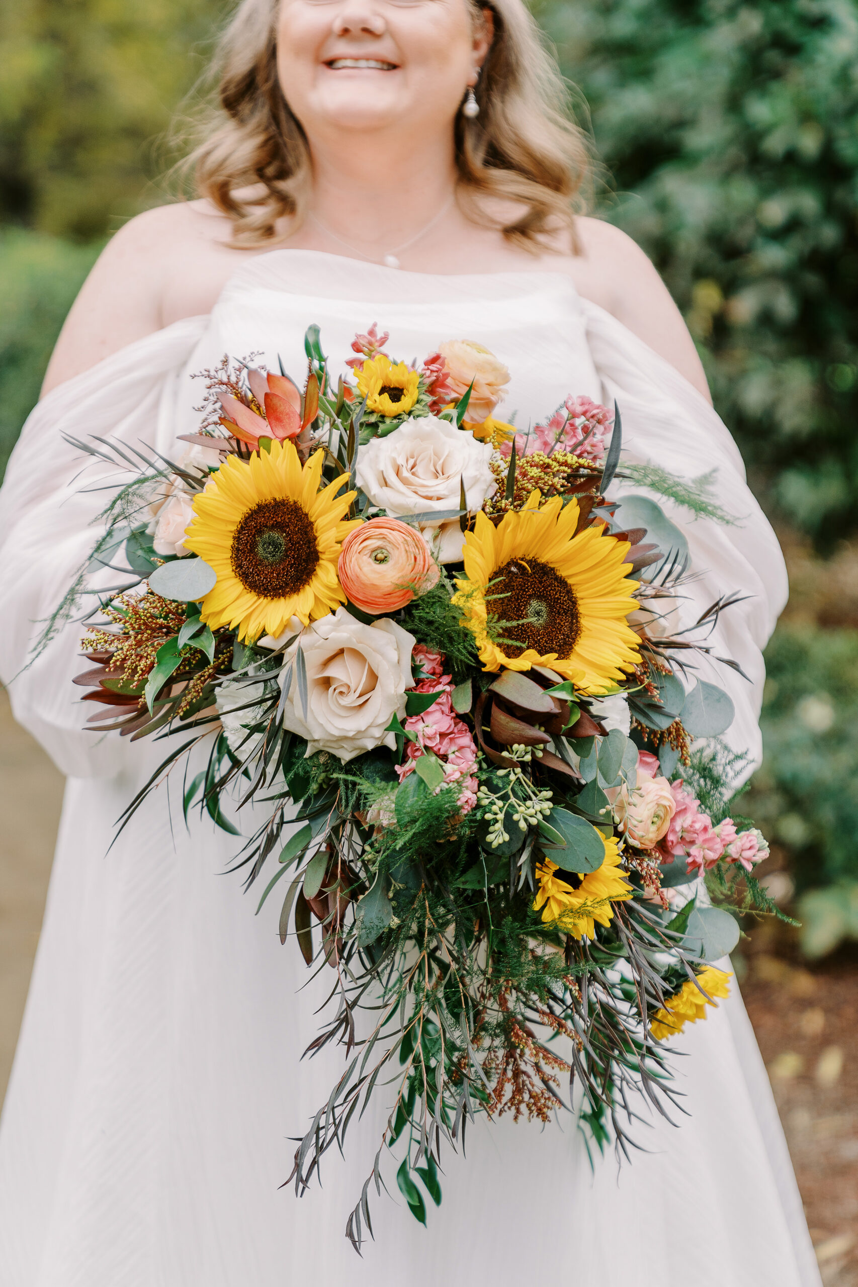 a bridal bouquet featuring sunflowers at The Maples Woodland photographed by Sacramento wedding photographer