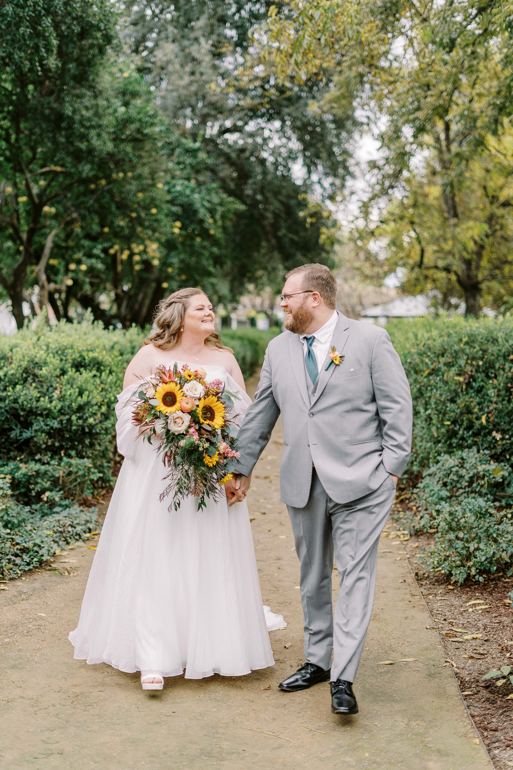 a bride and groom portrait in the trees at The Maples Woodland photographed by Sacramento wedding photographer