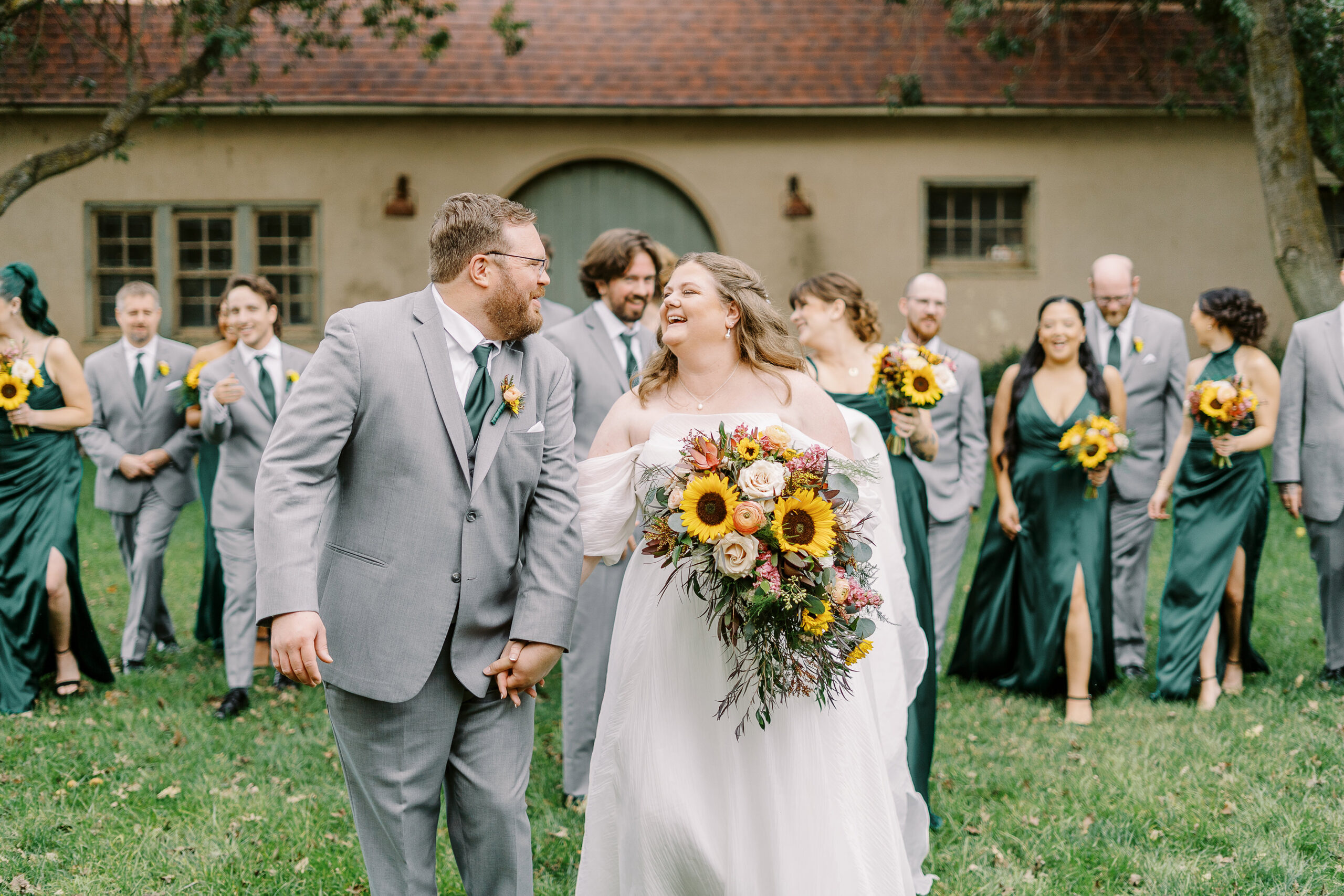 wedding party portraits in front of the stables at The Maples Woodland photographed by Sacramento wedding photographer