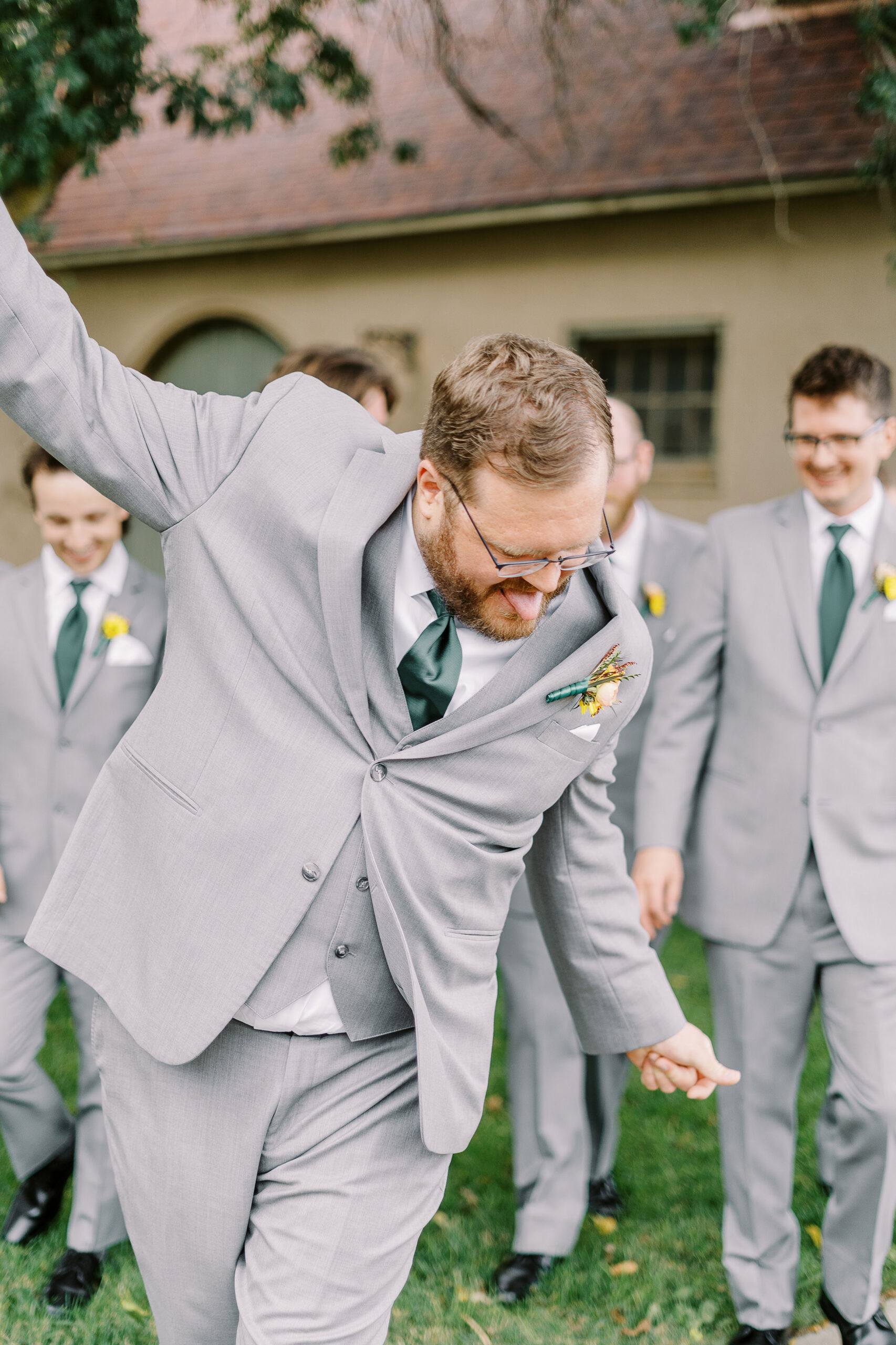 wedding party portraits in front of the stables at The Maples Woodland photographed by Sacramento wedding photographer