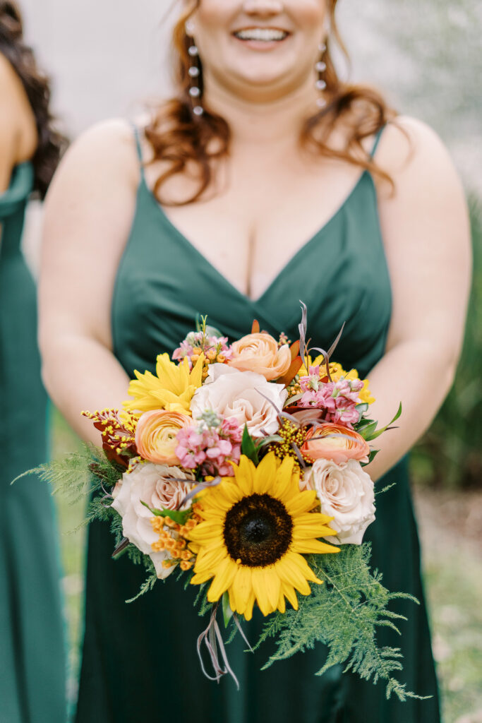 wedding party portraits in front of the stables at The Maples Woodland photographed by Sacramento wedding photographer