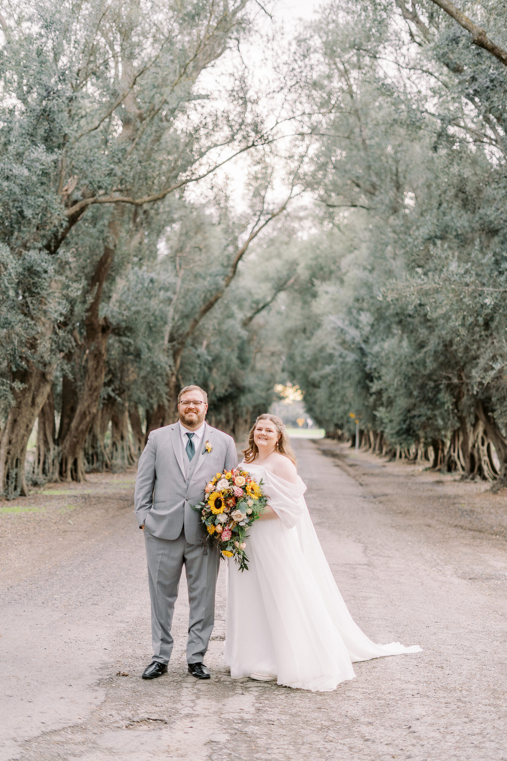 a bride and groom portrait in the trees at The Maples Woodland photographed by Sacramento wedding photographer