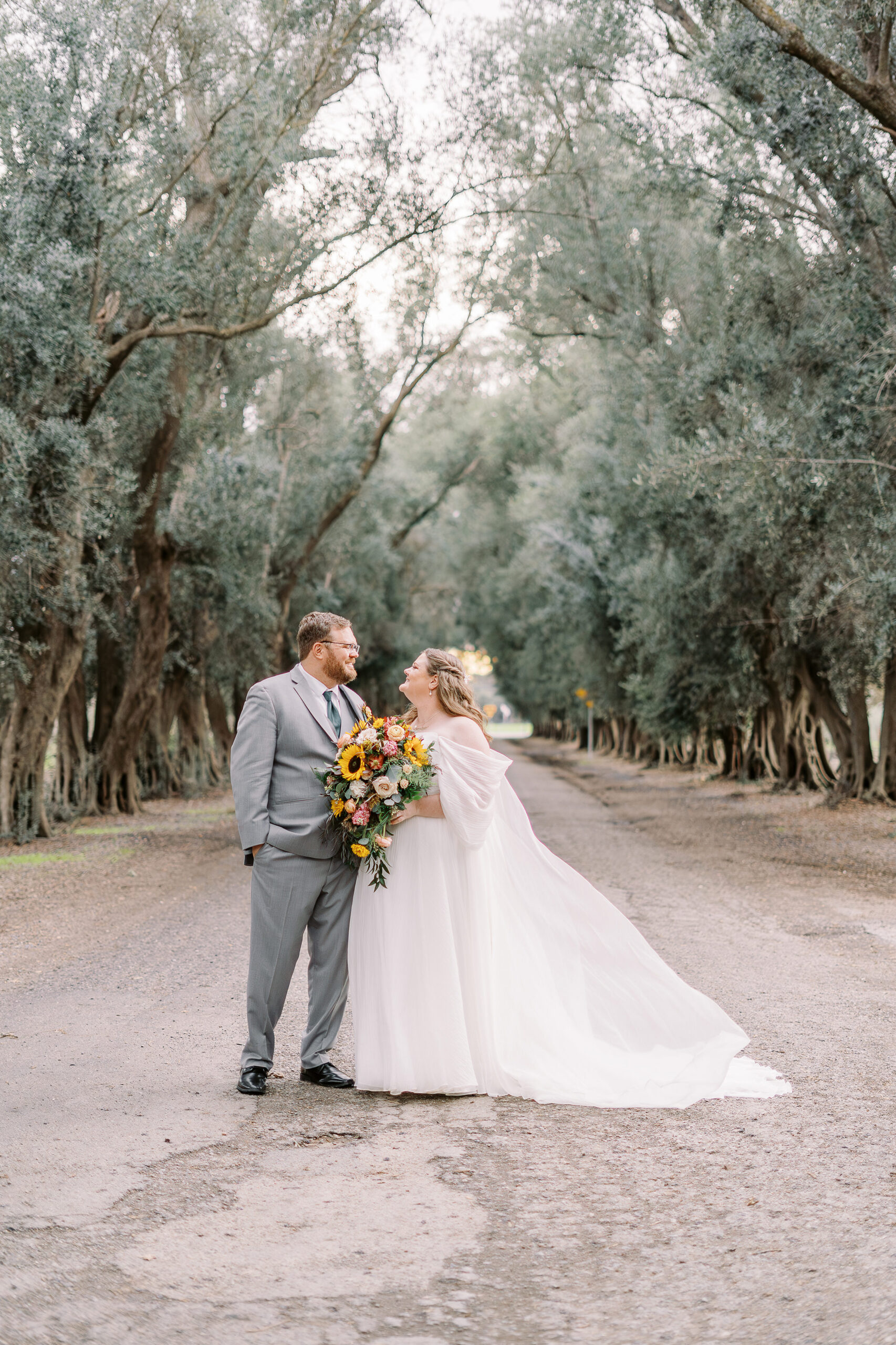 a bride and groom portrait in the trees at The Maples Woodland photographed by Sacramento wedding photographer