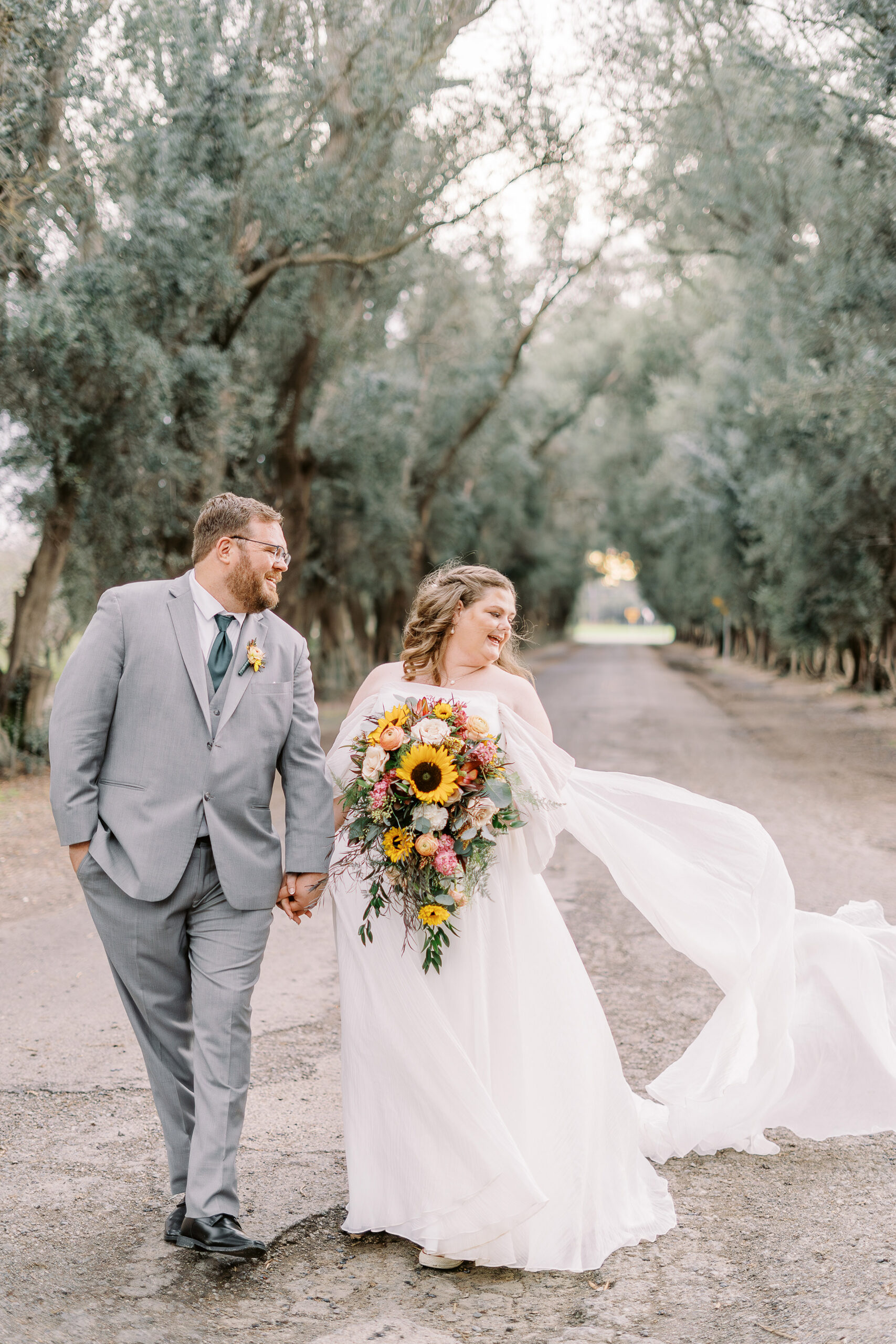 a bride and groom portrait in the trees at The Maples Woodland photographed by Sacramento wedding photographer