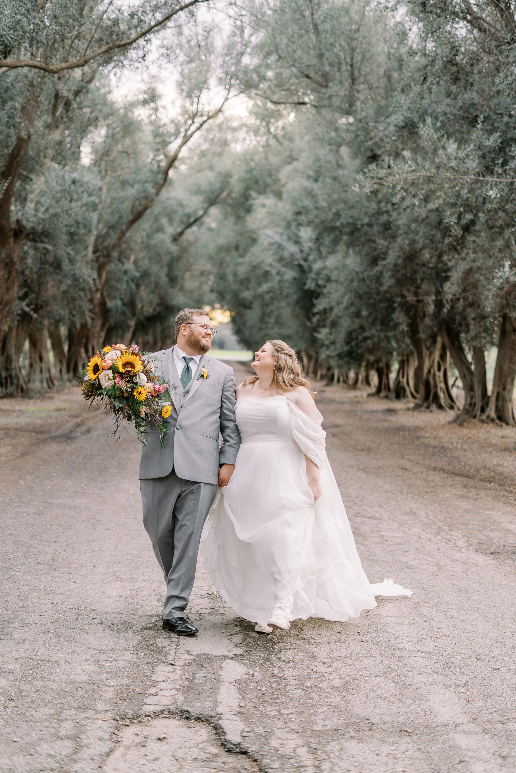 a bride and groom portrait in the trees at The Maples Woodland photographed by Sacramento wedding photographer