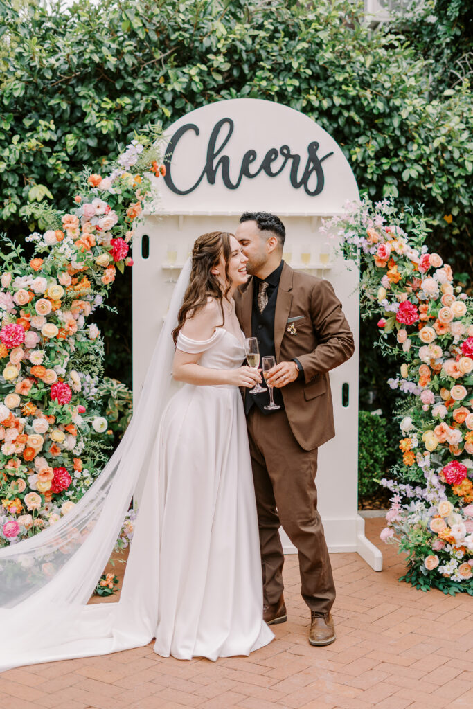 a bride and groom give a toast at Vizcaya photographed by Sacramento wedding photographers